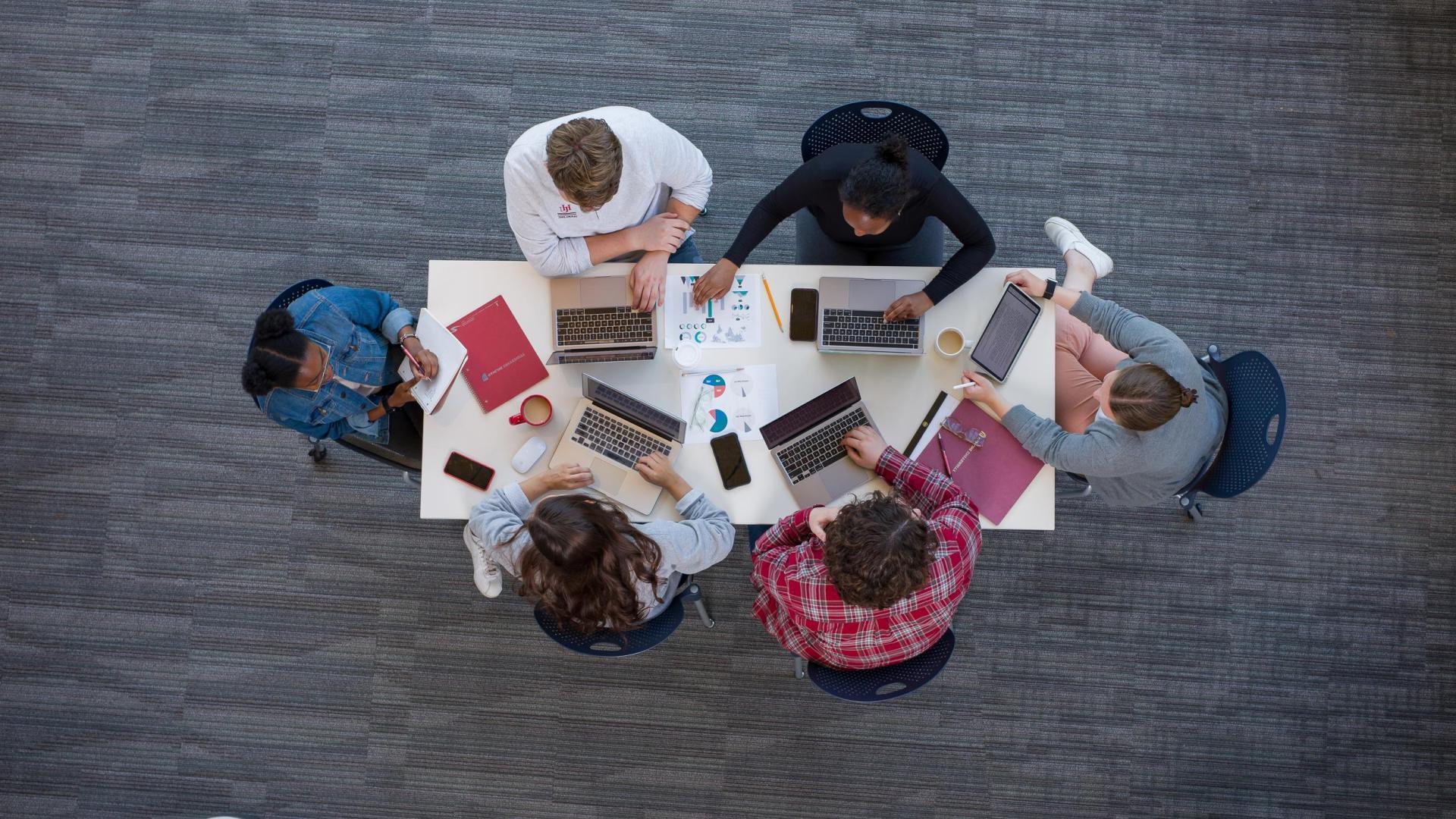 bird's eye view of Hamline students studying business